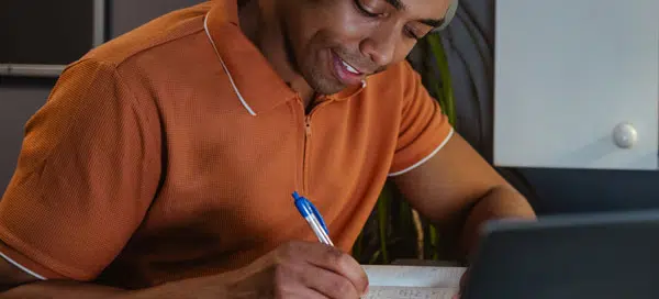 Student considering the pros and cons of online college